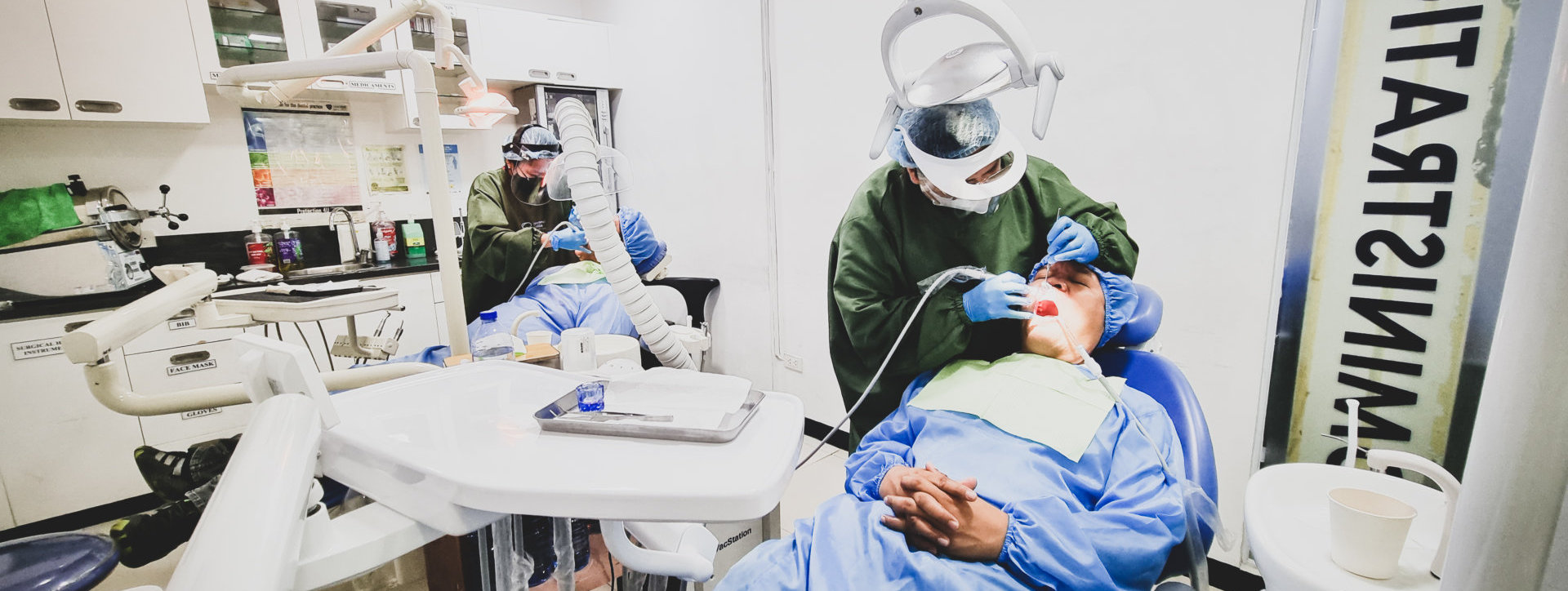 dentist checking the patients teeth